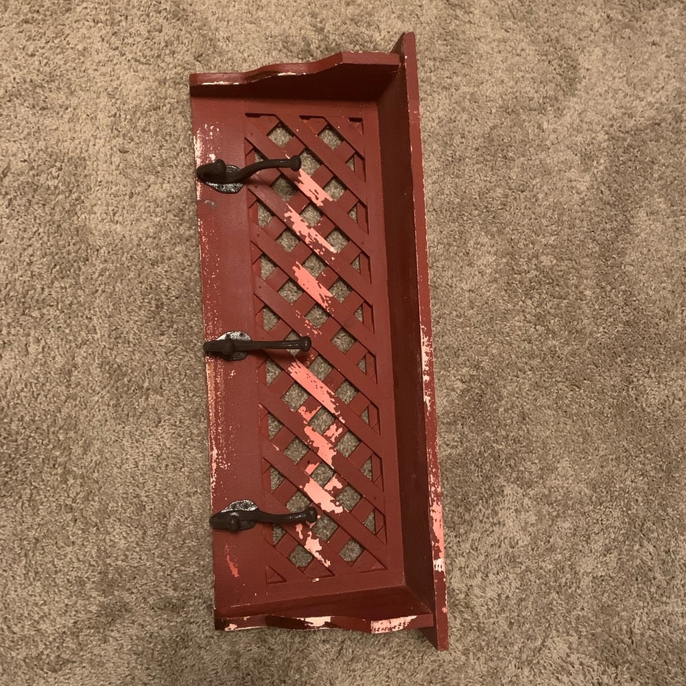 Rustic shelf with hangers